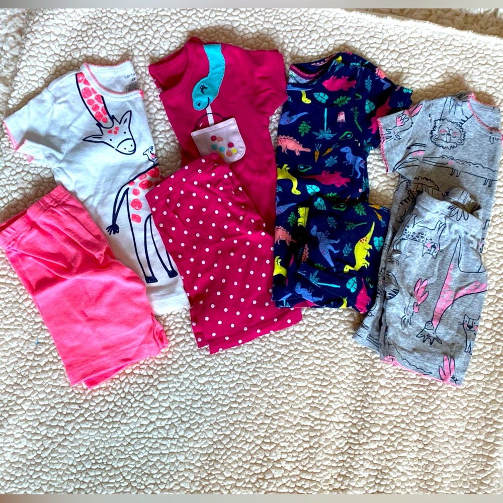 Four sets of Carter’s pajamas, little girls size 4T